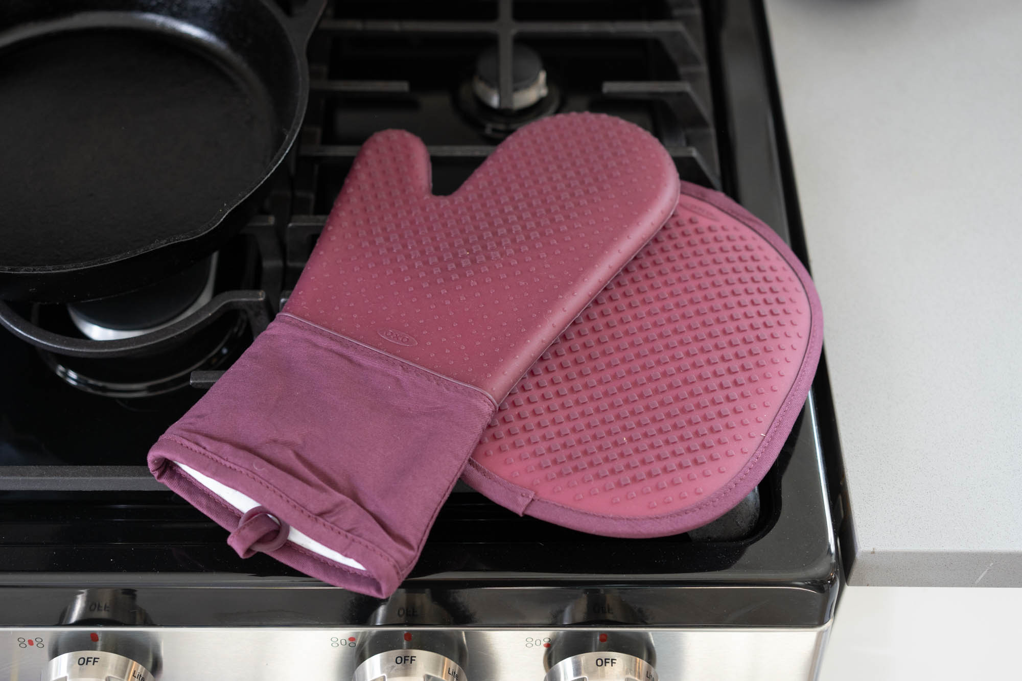 Set of grey KitchenAid oven mitt/pot holders